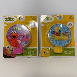 Lot of (2) Sesame Street LED Plug In Night Lights with Elmo and Abby Cadabby, an